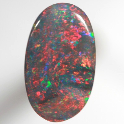 SOLID BLACK OPAL Gemmy red, very bright and rich SEE VIDEO